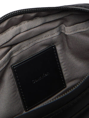 CALVIN ACC.1USCITA Pochette Calvin Klein Puffer Zip Pouch Nero