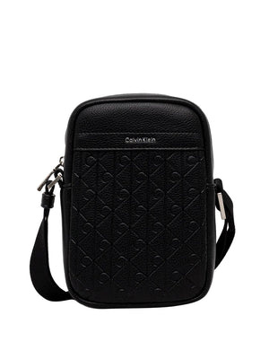 CALVIN ACC.1USCITA Borsa A Tracolla Calvin Klein Emblem Aop Emboss Slim Reporter - Nero