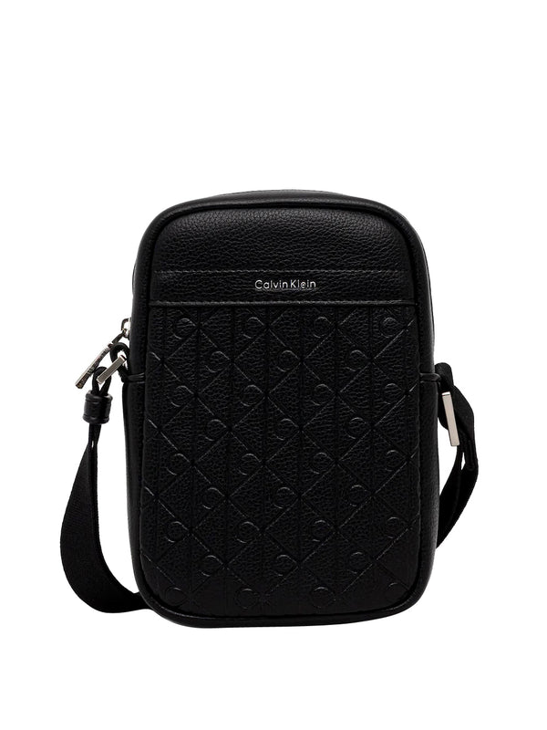 CALVIN ACC.1USCITA Borsa A Tracolla Calvin Klein Emblem Aop Emboss Slim Reporter - Nero