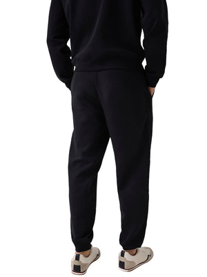 GUESS ATHLEISURE 1 USCITA Pantalone Tuta Guess Thor Cuffed - Nero