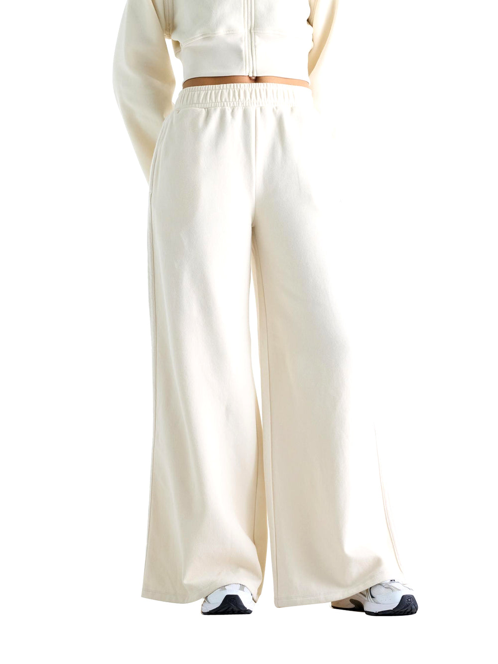 New Balance Pantaloni In Felpa Brushed Coastal Fleece New Balance - Linen