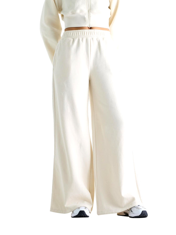 New Balance Pantaloni In Felpa Brushed Coastal Fleece New Balance - Linen