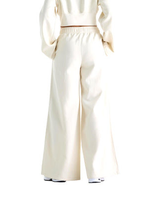 New Balance Pantaloni In Felpa Brushed Coastal Fleece New Balance - Linen