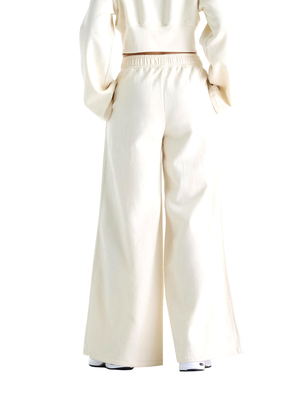 New Balance Pantaloni In Felpa Brushed Coastal Fleece New Balance - Linen